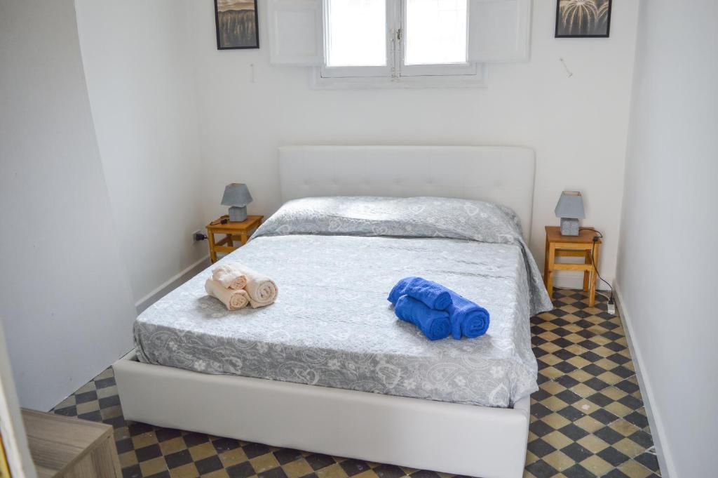 A bed or beds in a room at Sofia Pretty Appartament