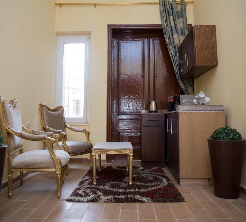 Kuchyň nebo kuchyňský kout v ubytování New Grand Royal Hotel Cairo