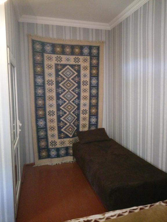 Postel nebo postele na pokoji v ubytování Abramichi Guest House