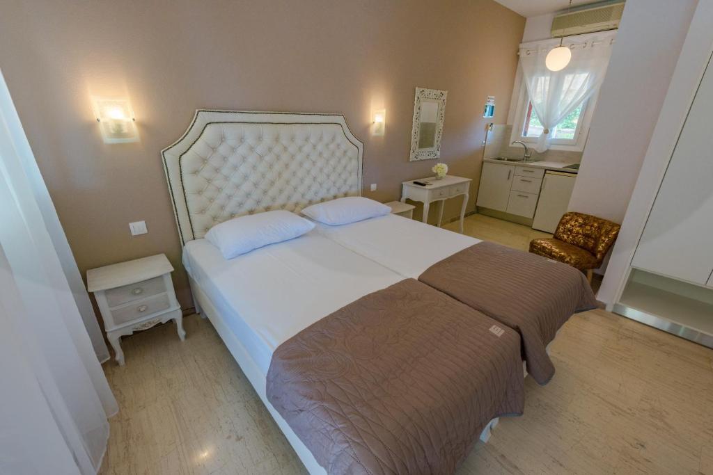 Postel nebo postele na pokoji v ubytování Villa Sophia Elena
