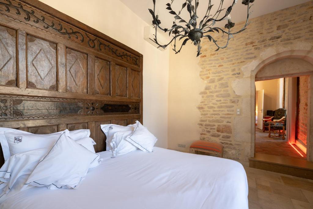 Postel nebo postele na pokoji v ubytování Abbaye de Maizières