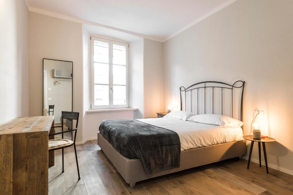 Łóżko lub łóżka w pokoju w obiekcie Casa Tonetta Luxury Apartments