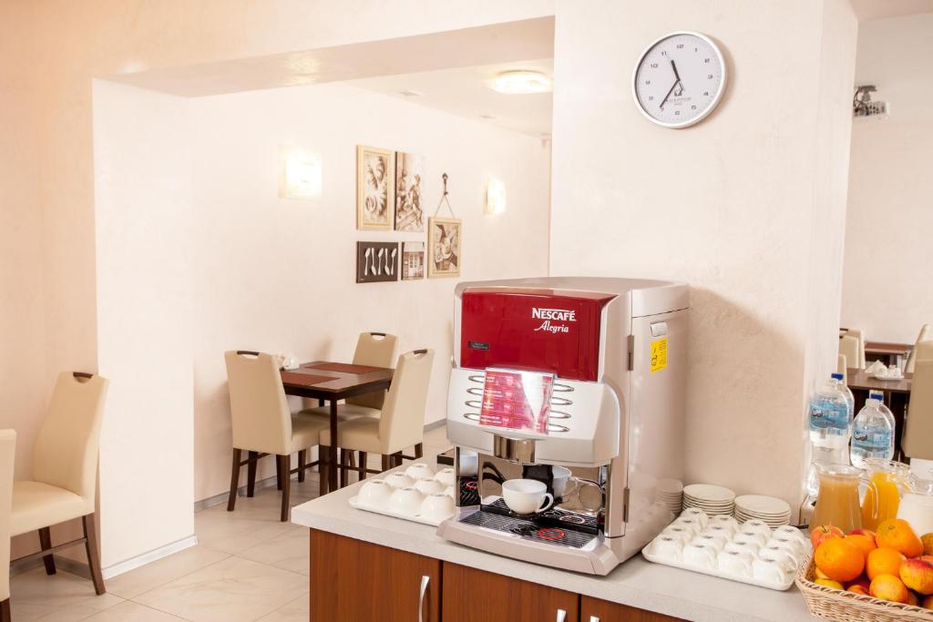 Kuchyň nebo kuchyňský kout v ubytování Mackintosh Hotel