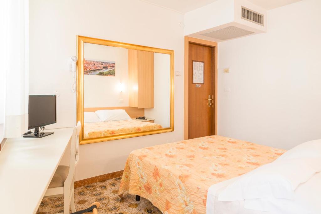 Postel nebo postele na pokoji v ubytování Albergo Trento