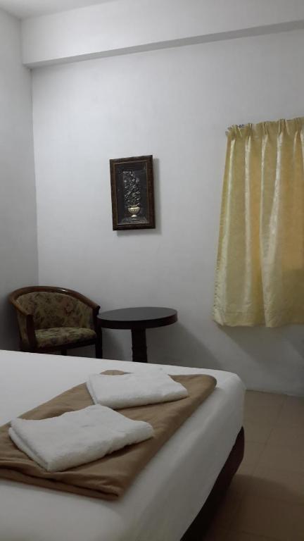 Postel nebo postele na pokoji v ubytování Rasa Motel