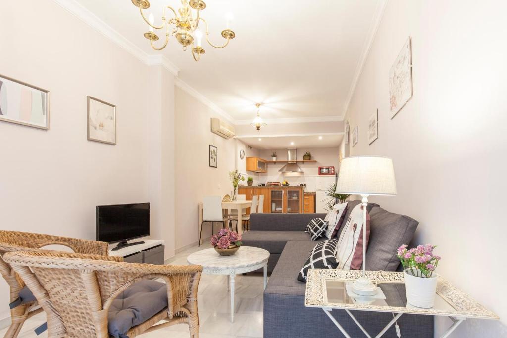 Telewizja i/lub zestaw kina domowego w obiekcie Elegante apartamento en el corazon de Sevilla.
