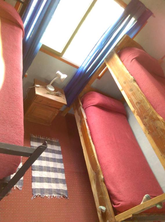 Katil atau katil-katil dalam bilik di Piuke Mapu Patagonia Hostel