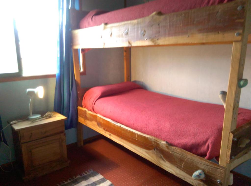 Katil atau katil-katil dalam bilik di Piuke Mapu Patagonia Hostel