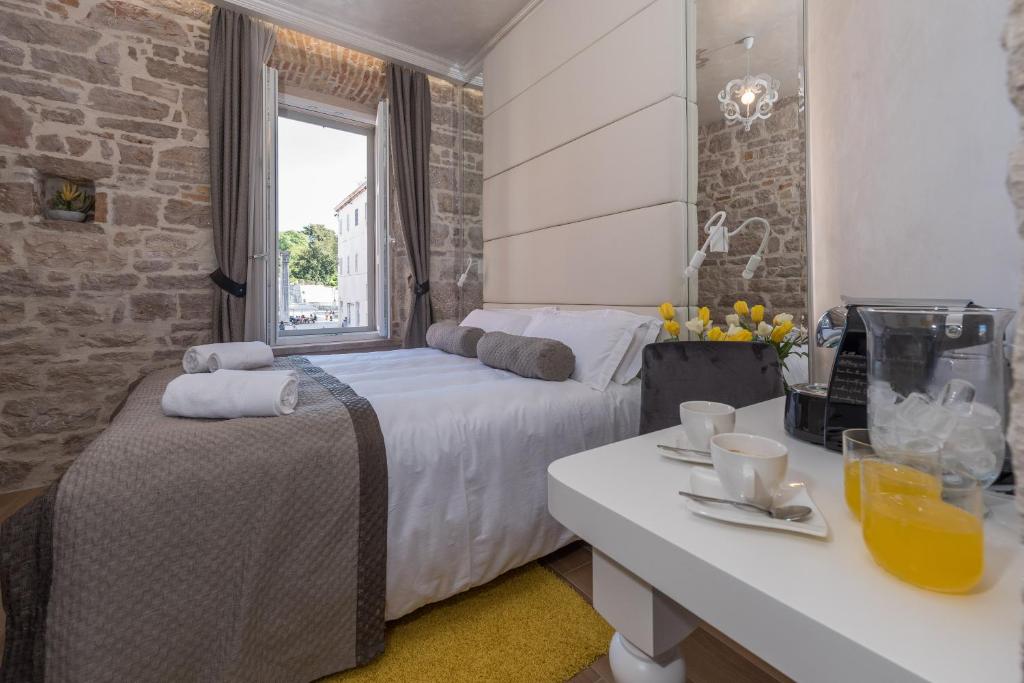 Posteľ alebo postele v izbe v ubytovaní Zara Palace - design rooms