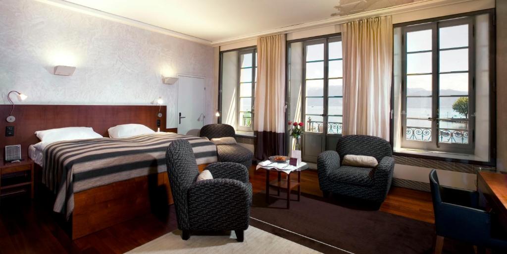 Postel nebo postele na pokoji v ubytování Hotel Angleterre