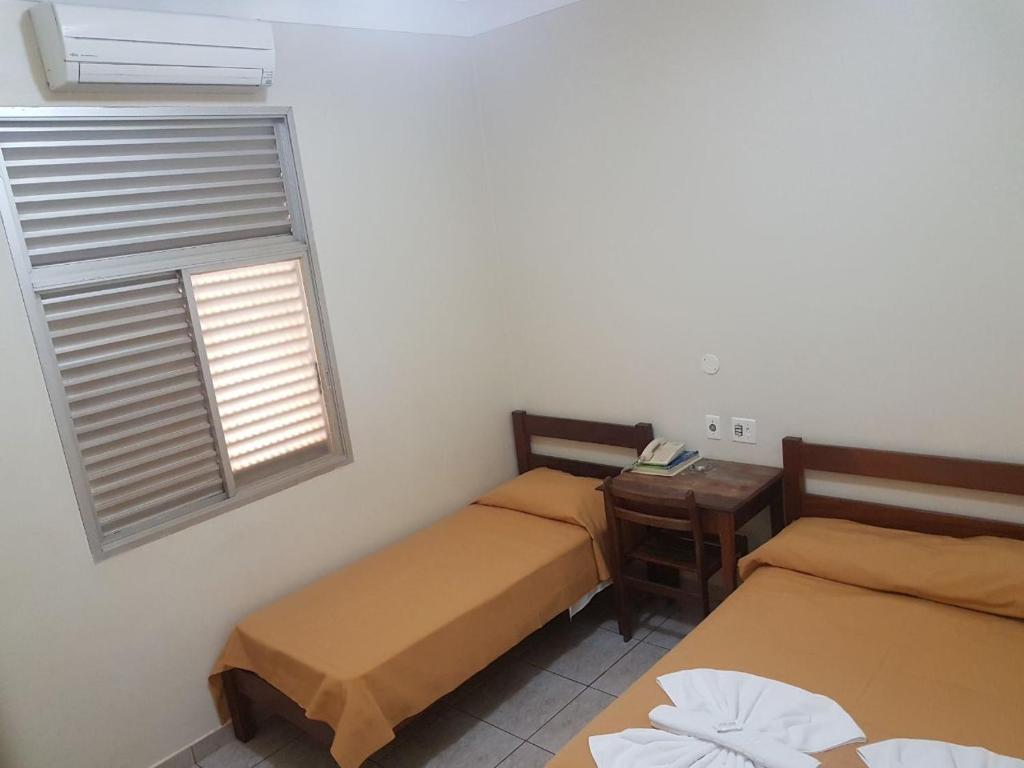 Postel nebo postele na pokoji v ubytování Scala Hotel Barretos