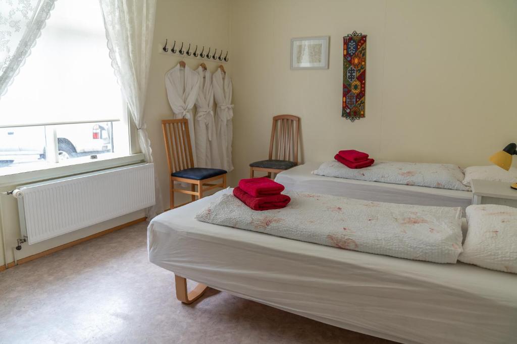Letto o letti in una camera di Guesthouse Gamla