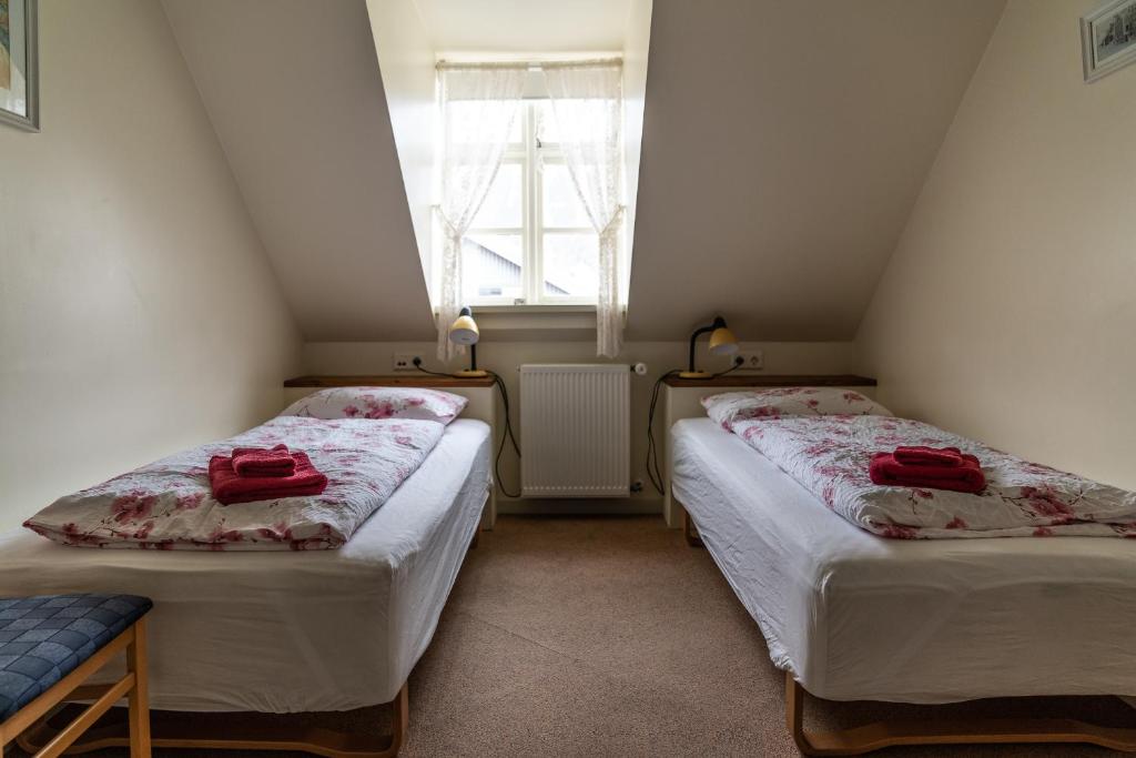Letto o letti in una camera di Guesthouse Gamla