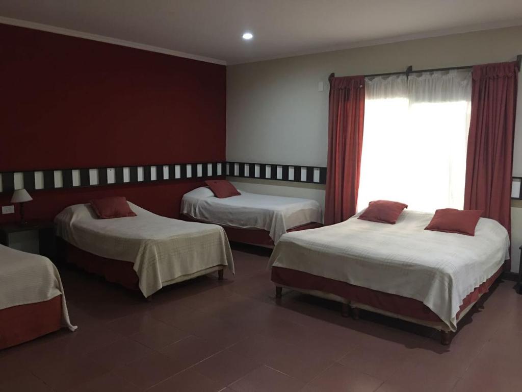 Ένα ή περισσότερα κρεβάτια σε δωμάτιο στο Hotel Don Horacio