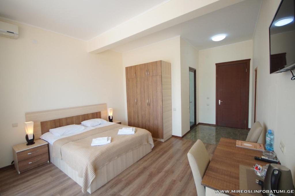 Postel nebo postele na pokoji v ubytování Hotel Mireosi
