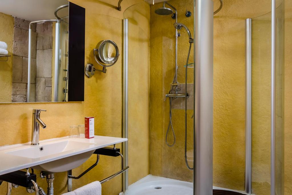 Kúpeľňa v ubytovaní Exe Cunit Suites & Spa