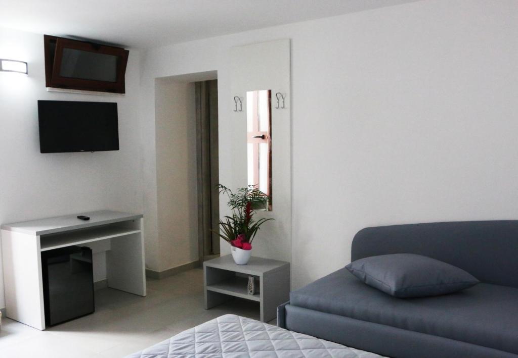 TV a/nebo společenská místnost v ubytování B&B Dolce Idea