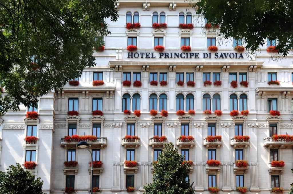 
a building with two windows and a large window at Hotel Principe Di Savoia - Dorchester Collection in Milan
