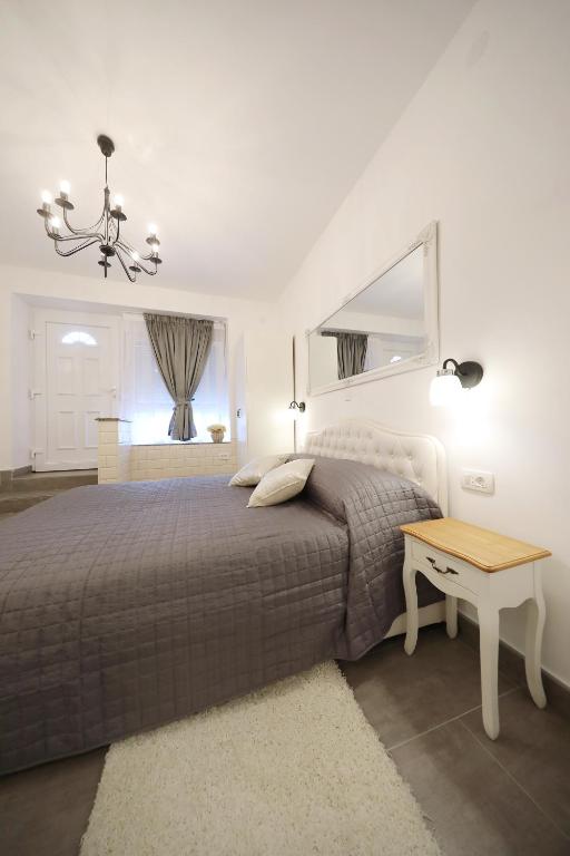 Posteľ alebo postele v izbe v ubytovaní Studio apartman Sendy