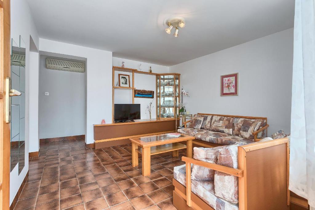 TV a/nebo společenská místnost v ubytování Apartments Vlasta