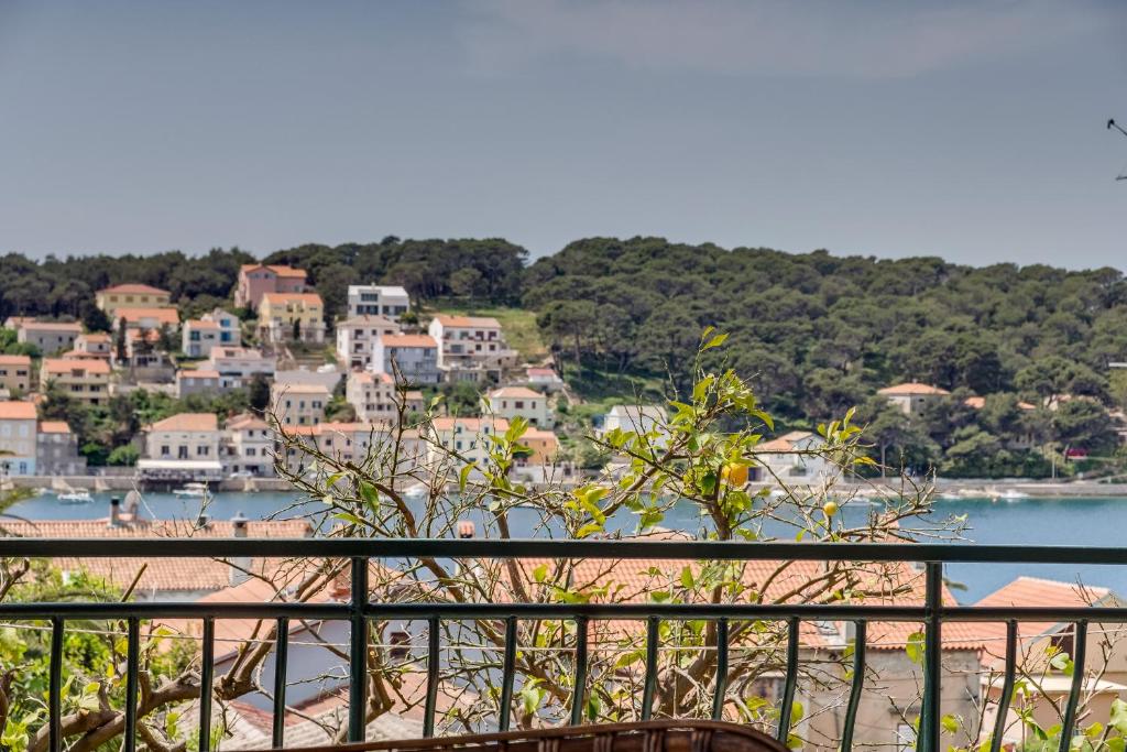 a view of a town from a balcony at Fioretta in Mali Lošinj