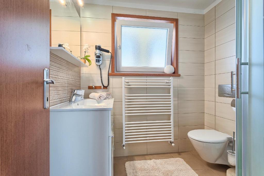 Koupelna v ubytování Apartments Vlasta