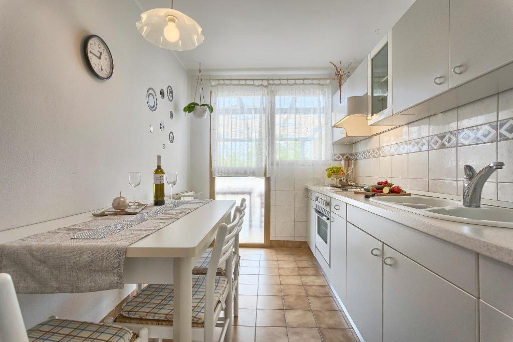 Kuchyň nebo kuchyňský kout v ubytování Apartments Vlasta
