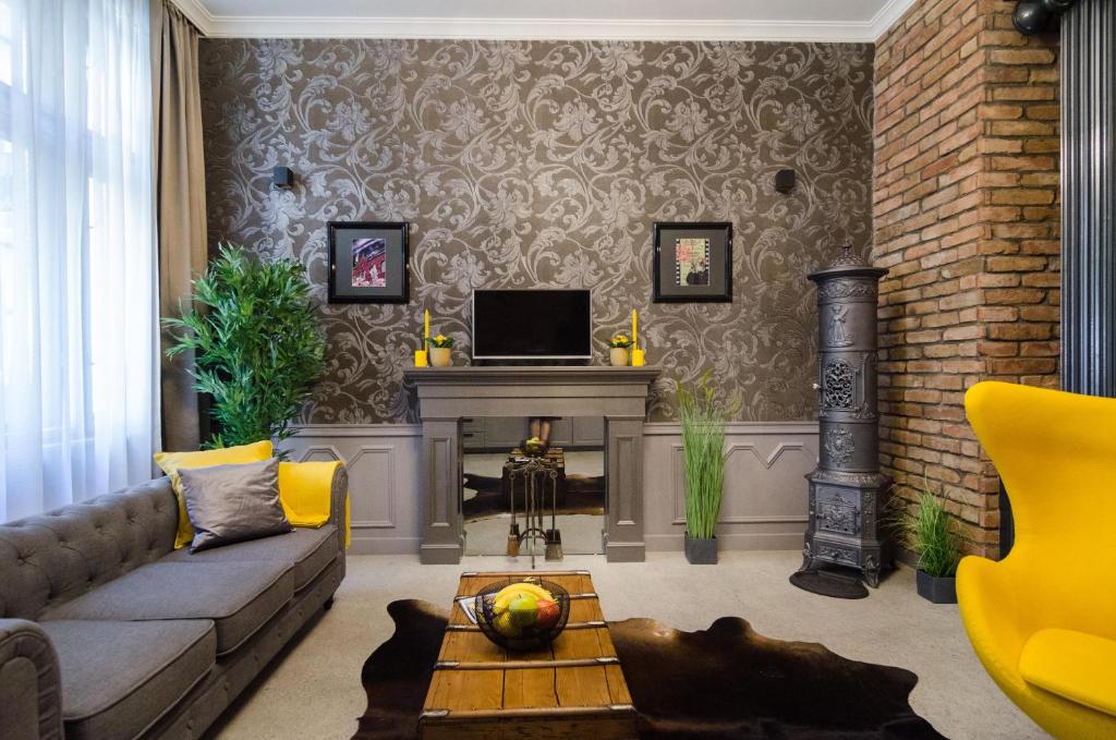 Televízia a/alebo spoločenská miestnosť v ubytovaní Viktoria Luxury Apartment