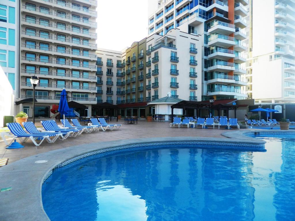 Bazén v ubytování Astur Hotel & Residence nebo v jeho okolí