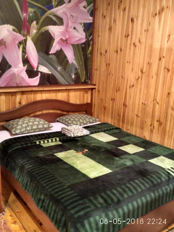 Postel nebo postele na pokoji v ubytování Kitech Guest House