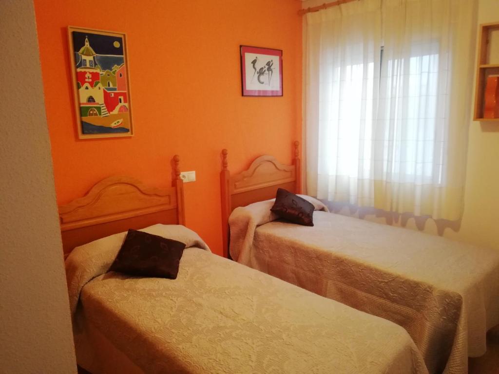 Posteľ alebo postele v izbe v ubytovaní Bungalow Junto A La Piscina, Gran Alacant