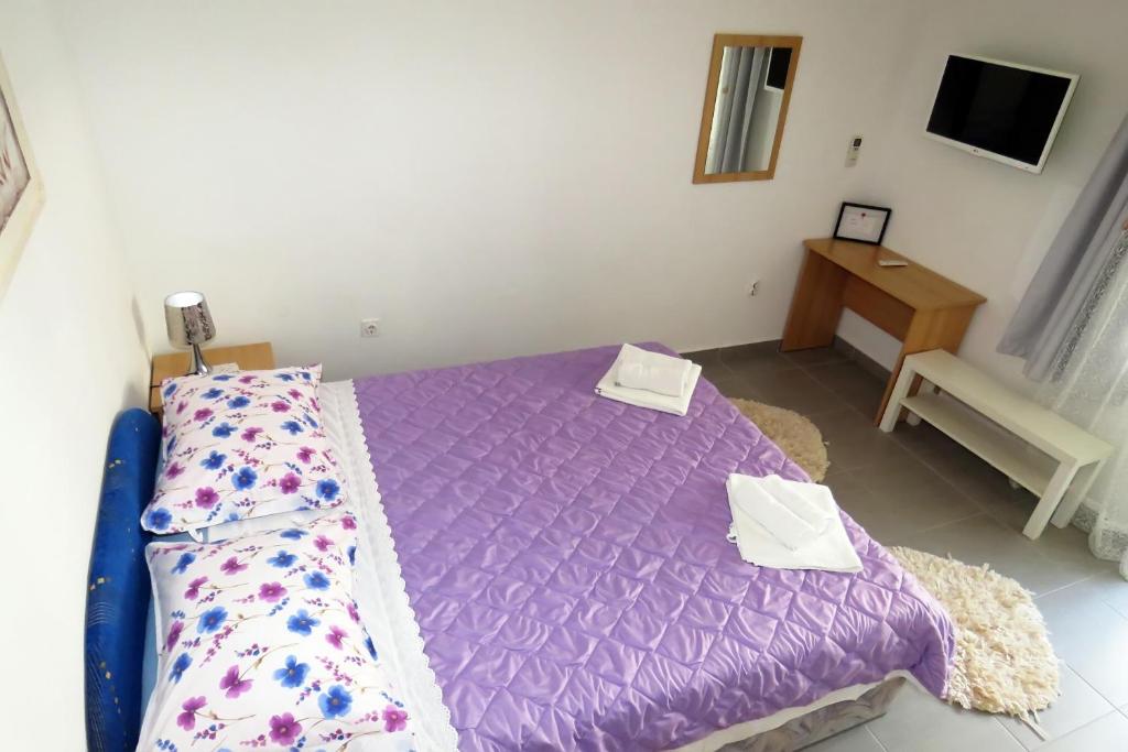 Posteľ alebo postele v izbe v ubytovaní Apartments Milena & Ante