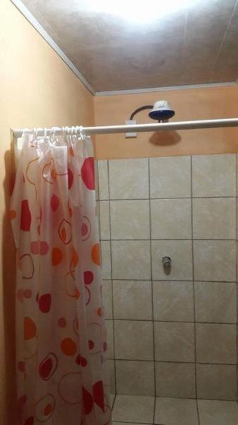Koupelna v ubytování Hotel Latino