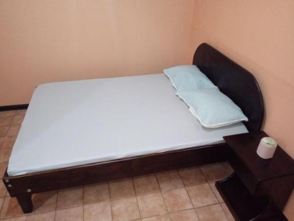 Postel nebo postele na pokoji v ubytování Hotel Latino
