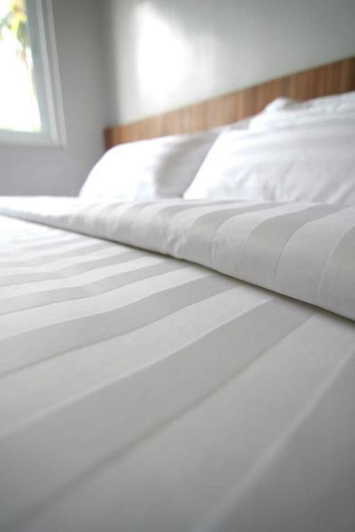 Letto o letti in una camera di Z Pad Residences