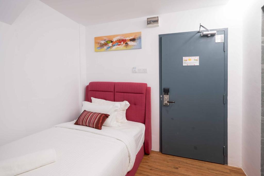 Postel nebo postele na pokoji v ubytování My Sj Hotel