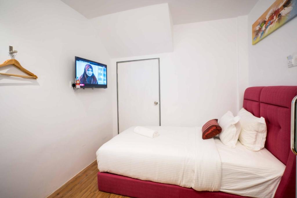 Postel nebo postele na pokoji v ubytování My Sj Hotel