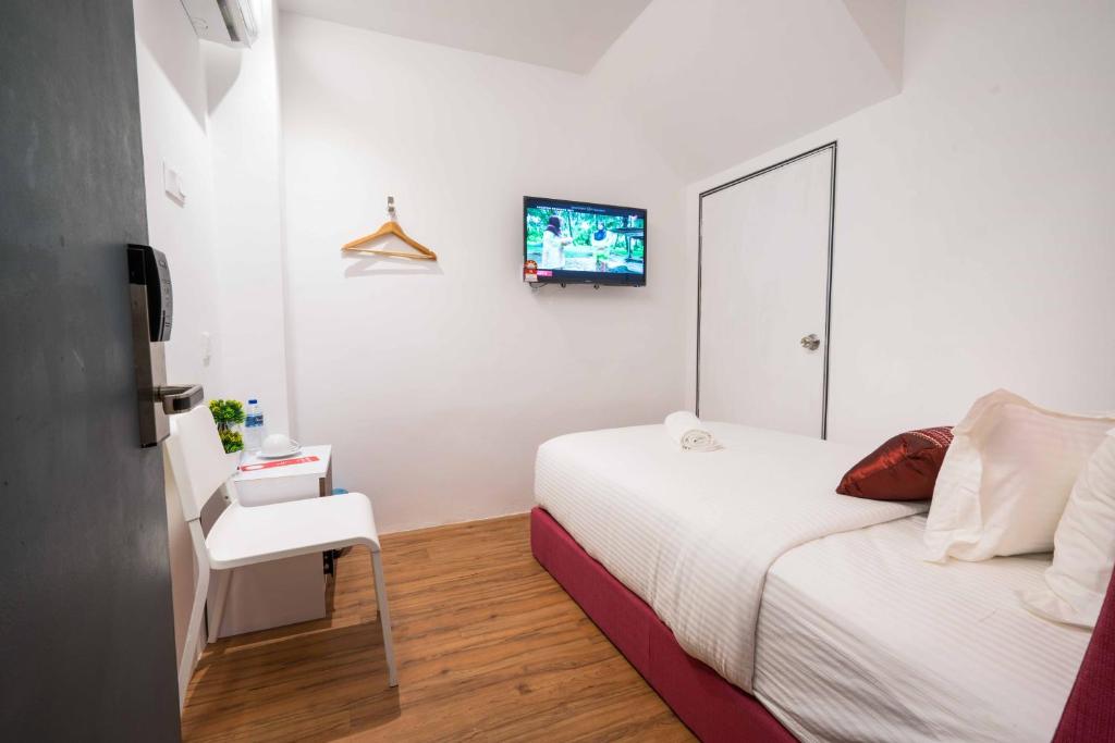 Postel nebo postele na pokoji v ubytování My Sj Hotel