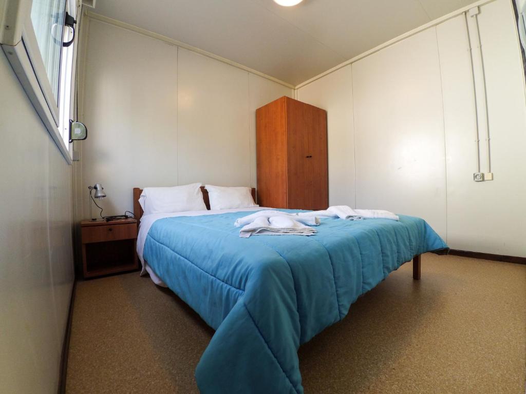 Postel nebo postele na pokoji v ubytování Camping Chania