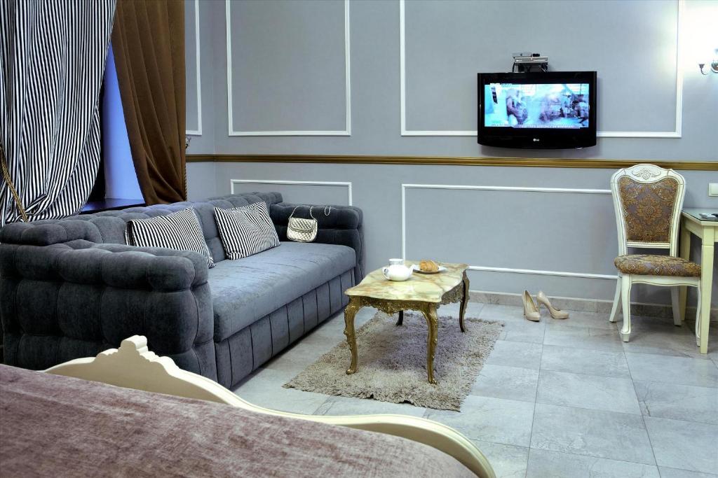 Posezení v ubytování Theatre Boutique Apartments