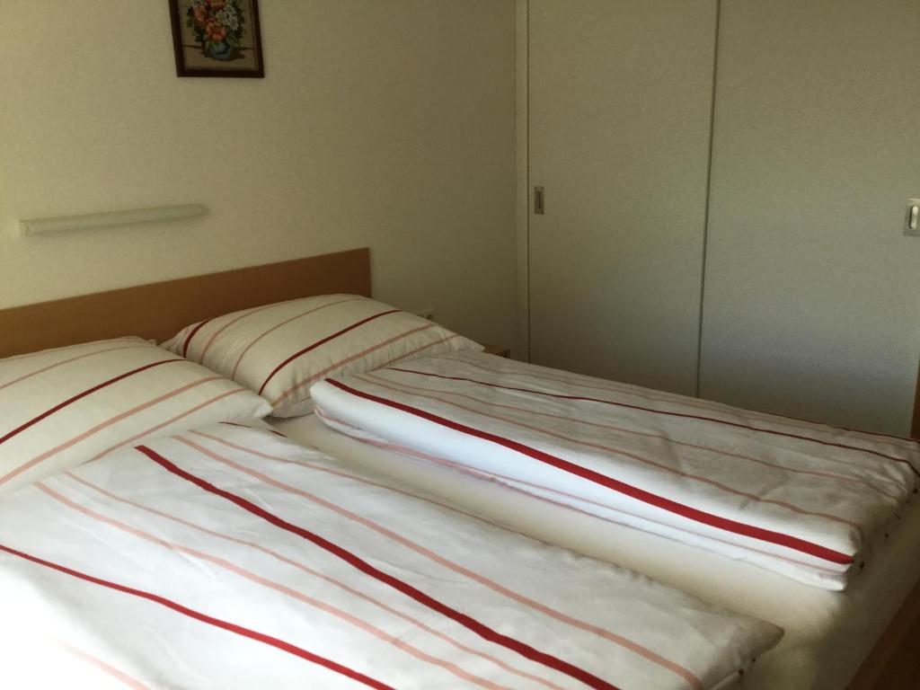 Postel nebo postele na pokoji v ubytování Gästehaus Pfandl