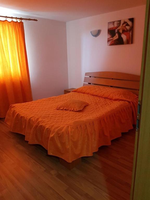Postel nebo postele na pokoji v ubytování Hotel Floare de Colt