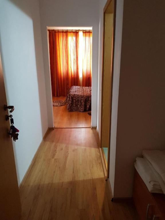 Postel nebo postele na pokoji v ubytování Hotel Floare de Colt