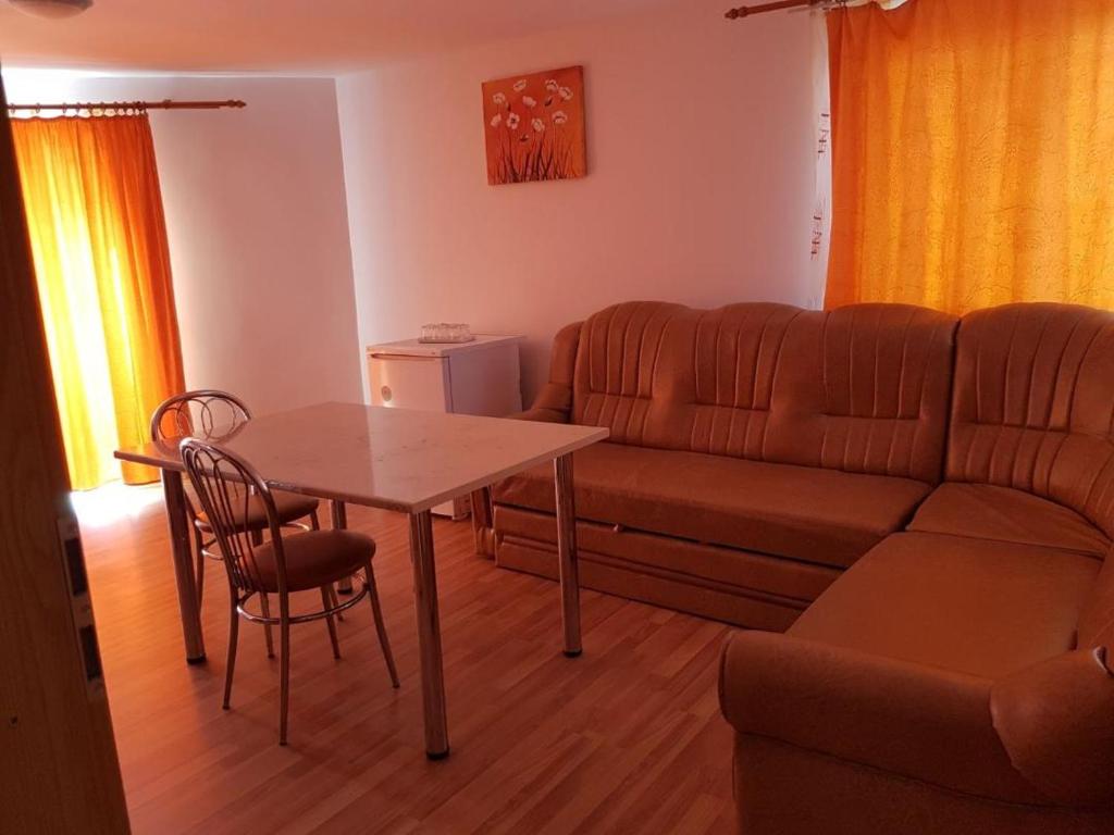 Posezení v ubytování Hotel Floare de Colt