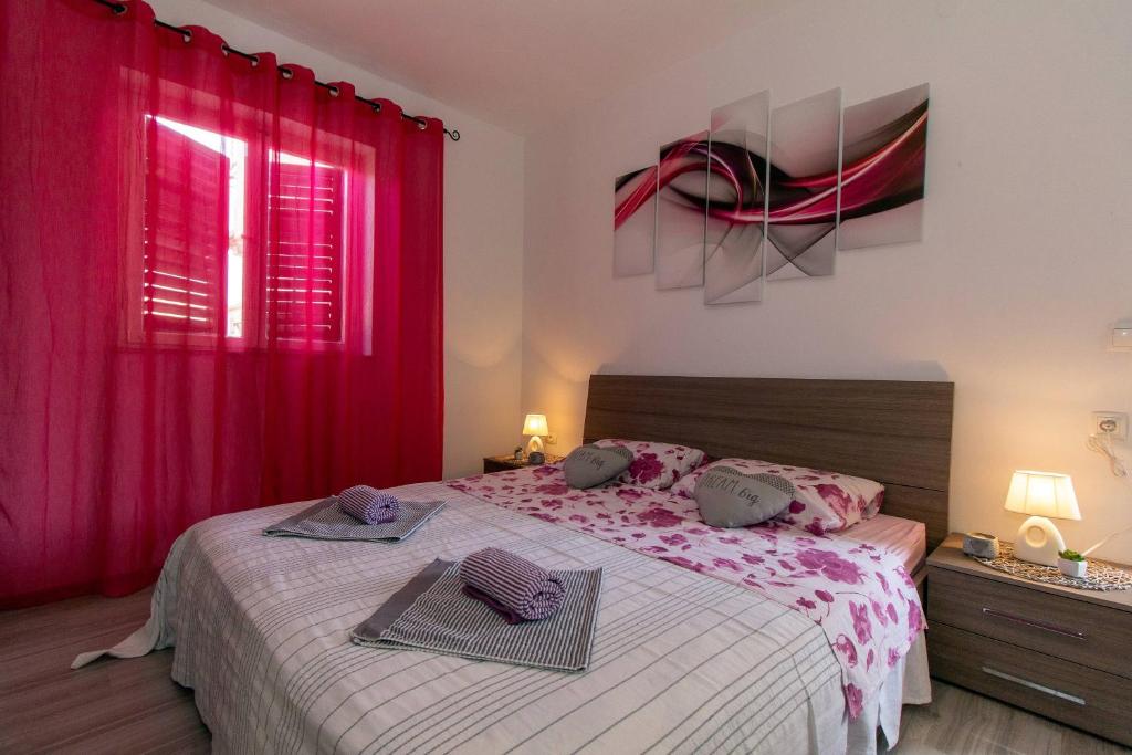Posteľ alebo postele v izbe v ubytovaní Apartman Borna