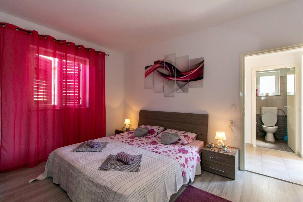 Posteľ alebo postele v izbe v ubytovaní Apartman Borna
