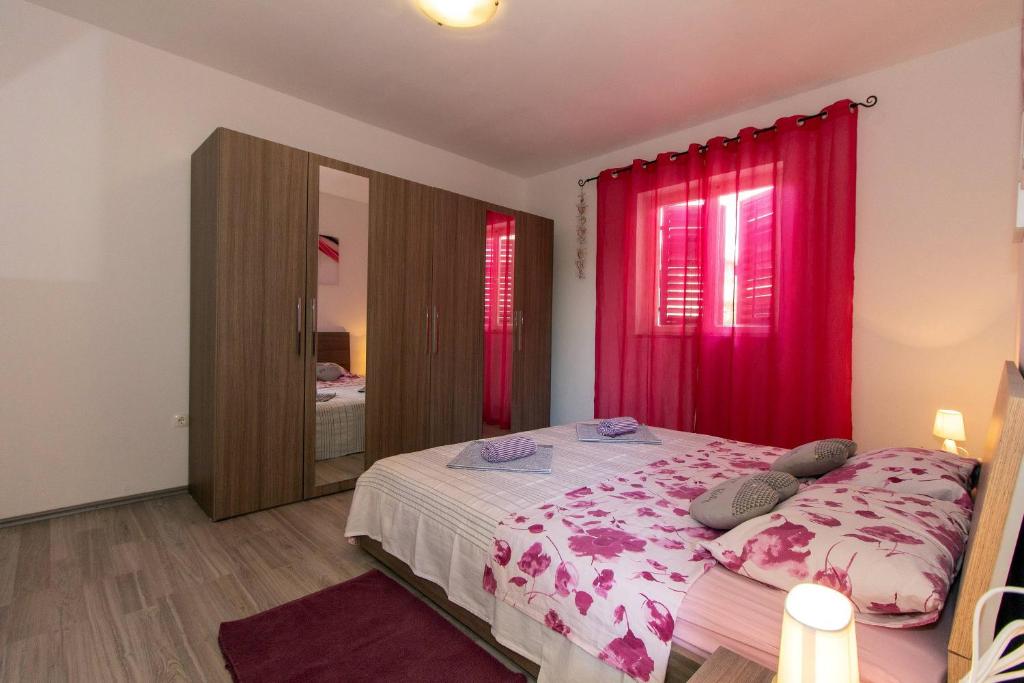 Posteľ alebo postele v izbe v ubytovaní Apartman Borna