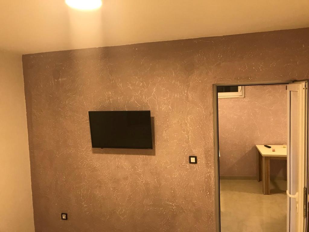 TV a/nebo společenská místnost v ubytování Vip Apartmani Canj