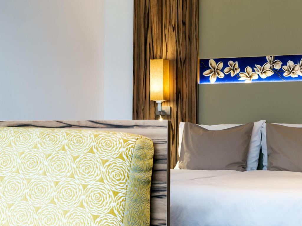 Postel nebo postele na pokoji v ubytování Hotel Ifinger