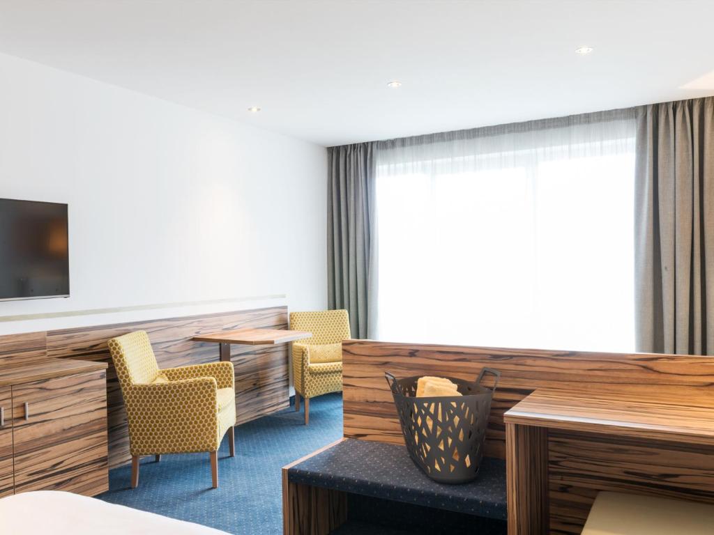 TV a/nebo společenská místnost v ubytování Hotel Ifinger